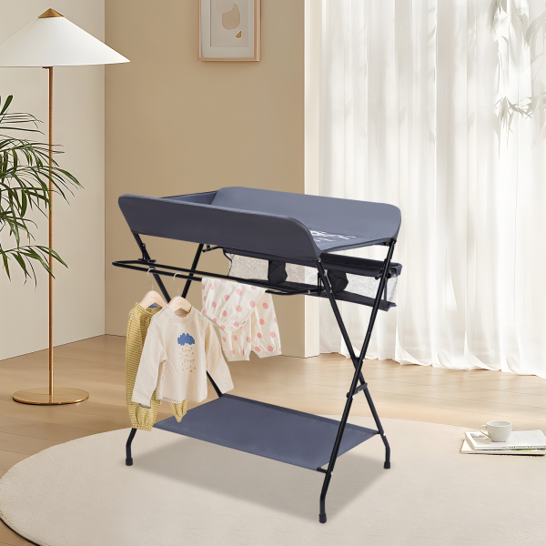 Cambiador plegable y portátil con cesta de almacenamiento lateral Cambiador plegable y portátil con cesta de almacenamiento lateral